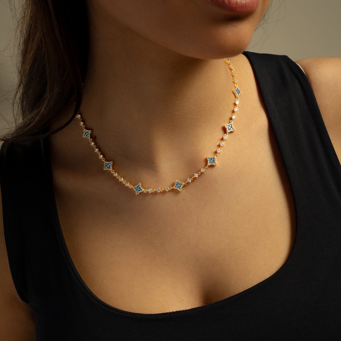 Chaîne Flower Tennis Dorée - Pierres bleues